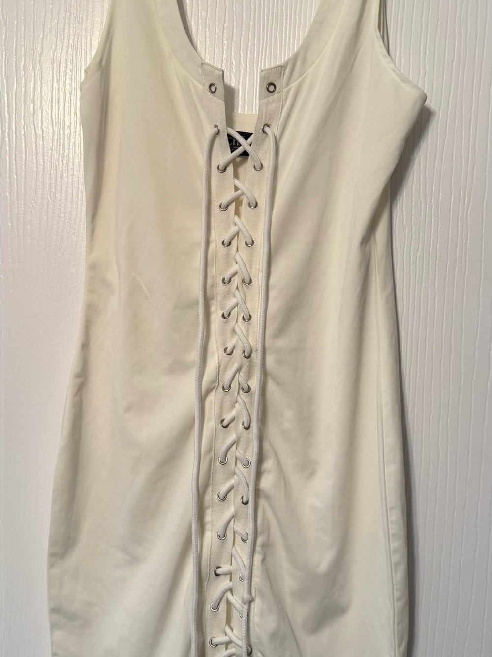 Sleeveless Cream Lace-Up Mini Dress